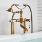 Elegant Dual-Handle Floor-Mount Bathtub Faucet with Handheld Shower