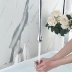 Contemporary Polished Basin Faucet - Deck Mounted Single Handle